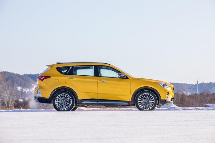 Yellow Jetour X70 Coupe SUV in Snow