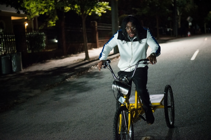 Katt Williams on a tricycle in The House Next Door: Meet The Blacks 2