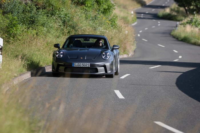 2021 Porsche 911 GT3 Touring on a winding road