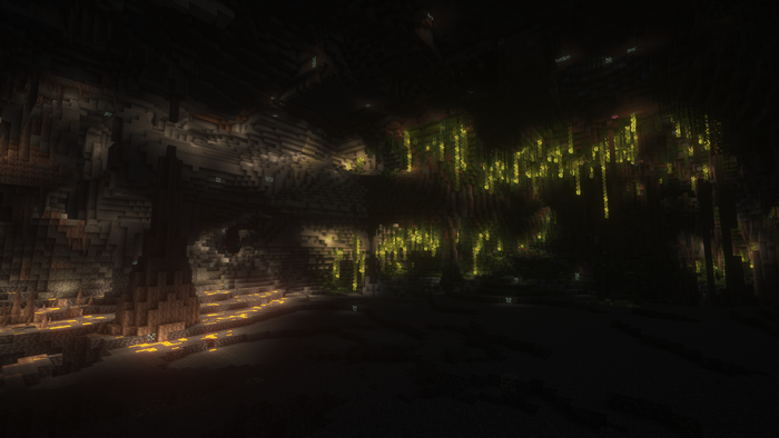 Minecraft cave with glowing flora and lava