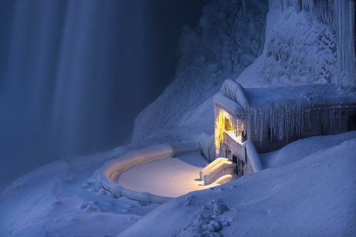 Frozen building and pool at Niagara Falls in winter