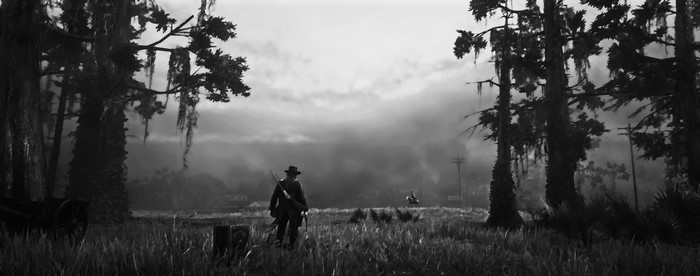 Red Dead Redemption 2 screenshot of a man in a field