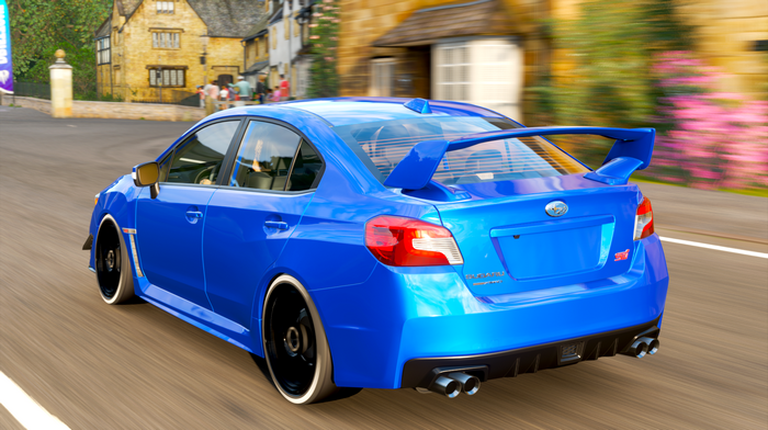 Blue Subaru WRX STI driving in Forza Horizon 4