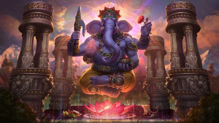 Ganesh, Hindu deity, sitting in meditation with lotus flowers