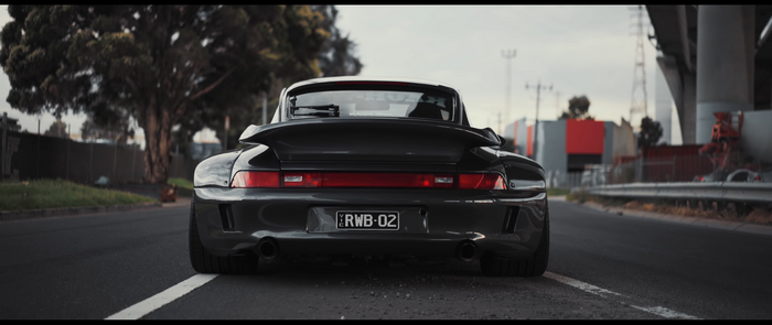 Black Porsche 911 RWB 02 on a Road
