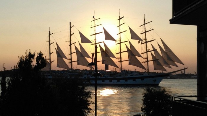 Sailing ship at sunset in Venice