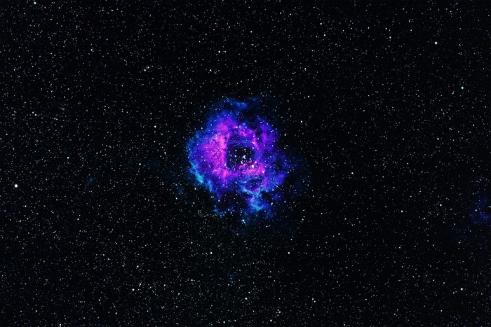 Rosette Nebula in deep space with stars