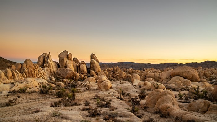 Desert Landscape with Rocks at Sunset