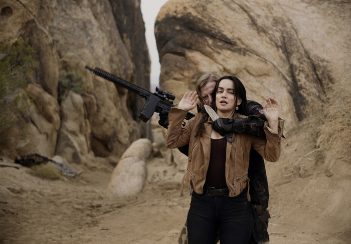 Ana de la Reguera held hostage with knife in The Forever Purge