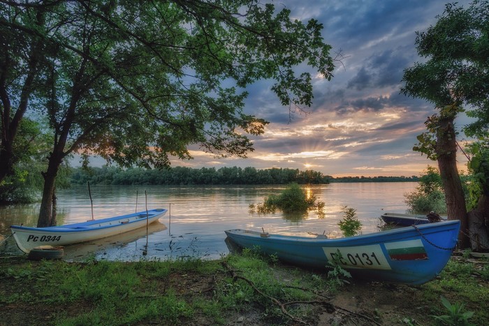 Boats on the river at sunset