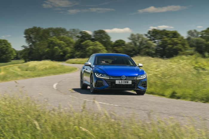 Blue 2021 Volkswagen Arteon Shooting Brake R driving on a country road