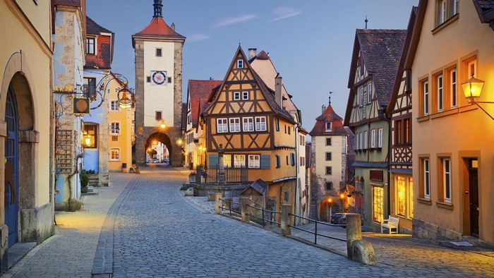 Rothenburg ob der Tauber clock tower and buildings at dusk