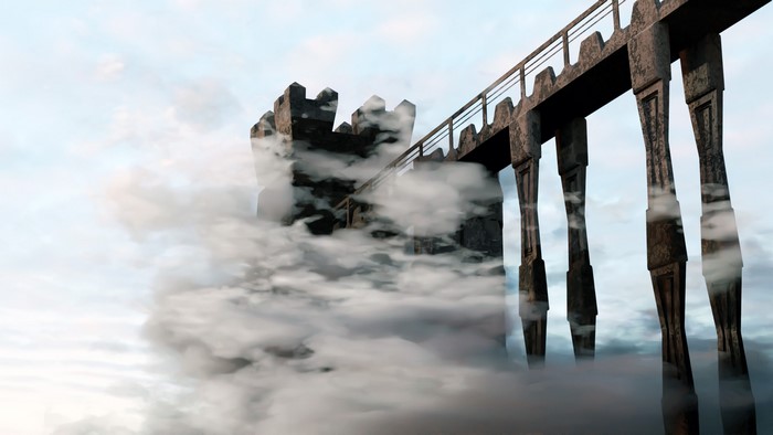 Castle tower and bridge emerging from clouds