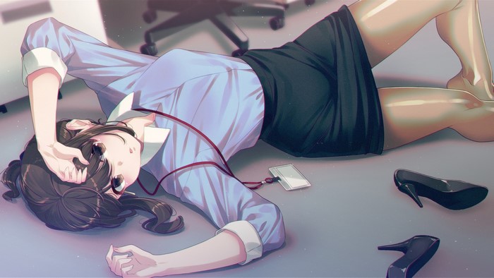 Anime girl lying on the floor in an office