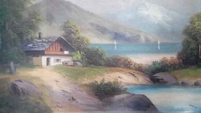 Oil painting of a cottage by a lake with mountains