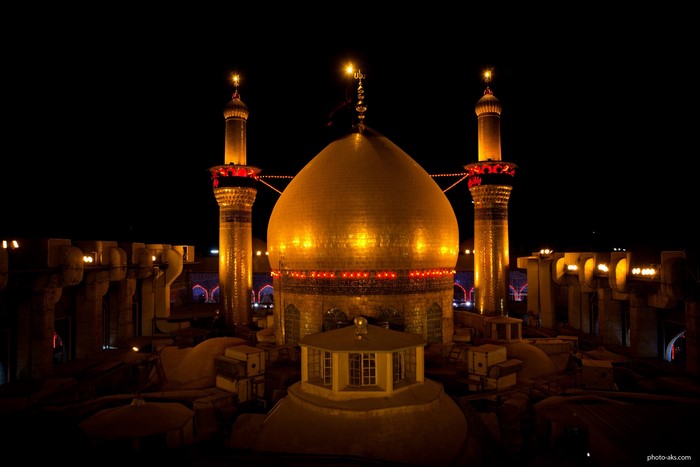 Golden Mosque Dome and Minarets in Najaf, Iraq at Night