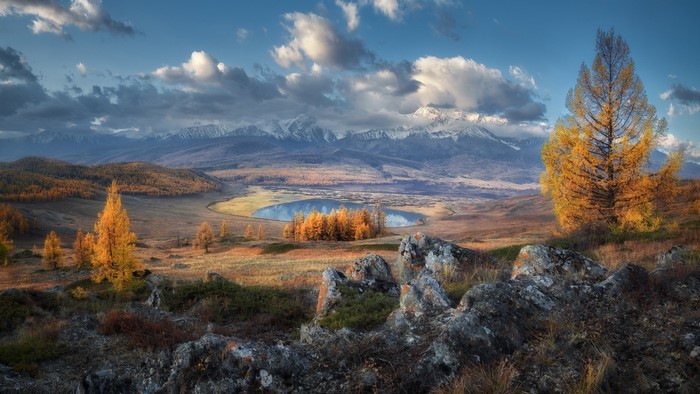 Autumn landscape with lake and mountains