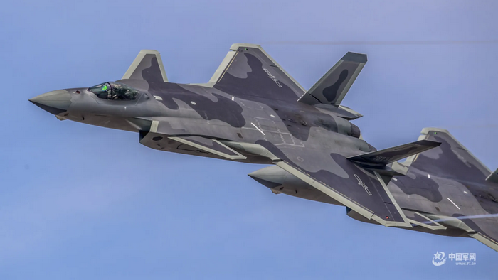 Two J-20 fighter jets in flight