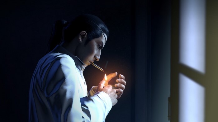 Goro Majima from Yakuza 0 lighting a cigarette