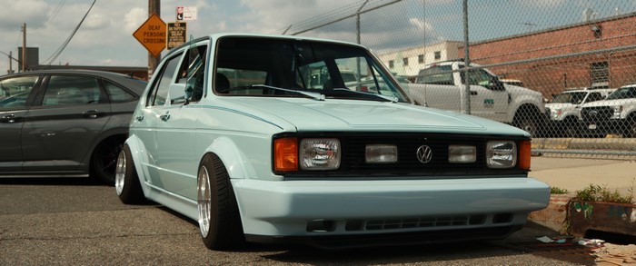 Light blue Volkswagen Golf Mk1 with custom modifications
