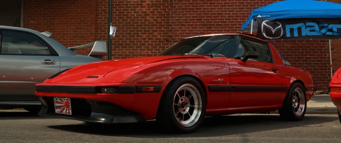 Red Mazda RX-7 at a Car Show