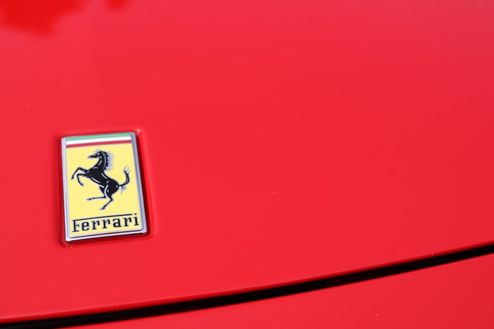 Ferrari logo on red car