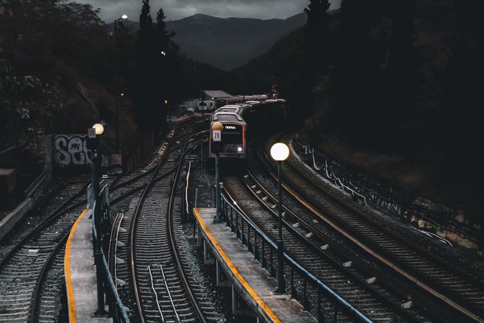 Train on railway tracks at dusk