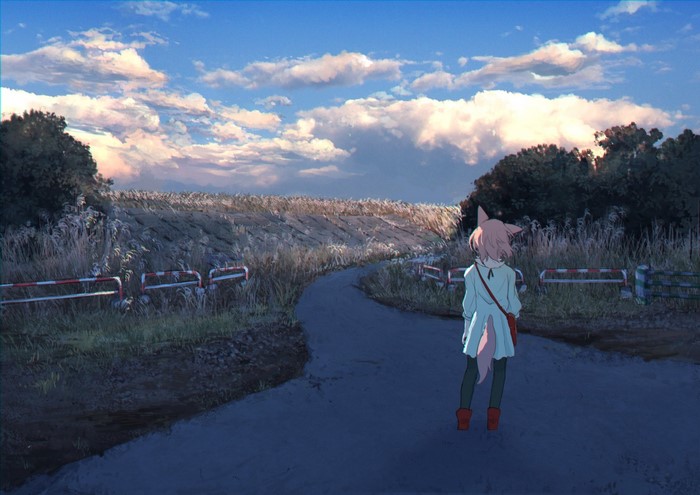 Girl with animal ears and tail on a road at sunset