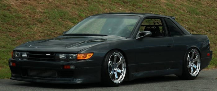 Dark grey Nissan Silvia S13 drift car
