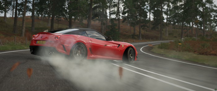 Red Ferrari GTO drifting on a road in Forza Horizon 4