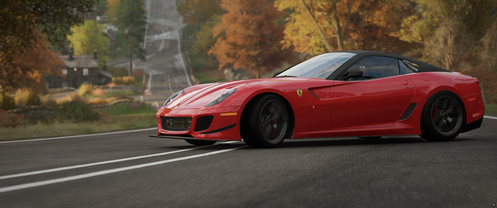 Red Ferrari GTO driving on a road in Forza Horizon 4
