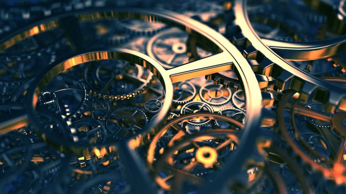 Close-up of intricate golden and metallic gears