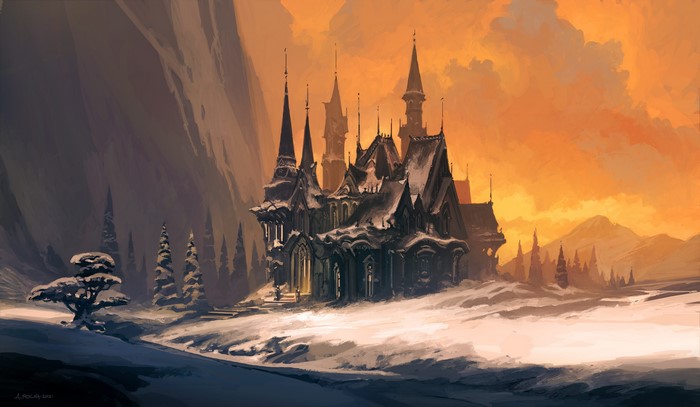 Gothic castle in a snowy landscape at sunset