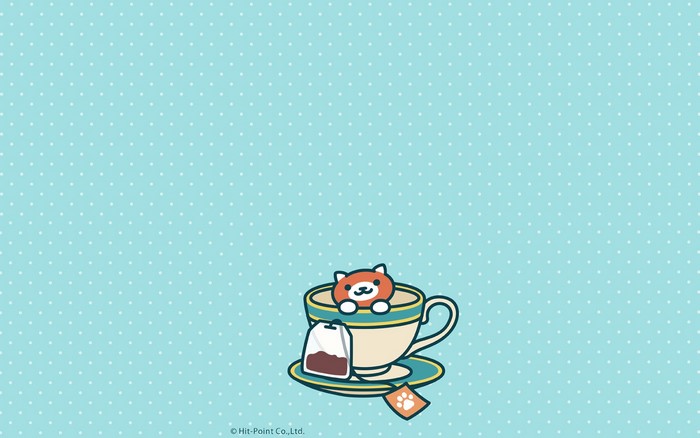 Cute cat in a teacup with tea bag