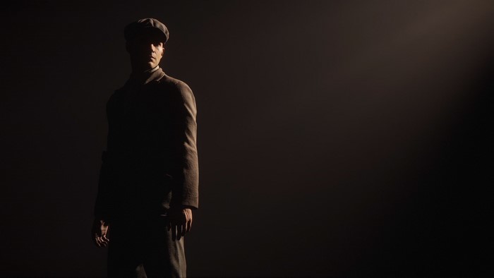 Man in a cap and suit from Mafia: Definitive Edition