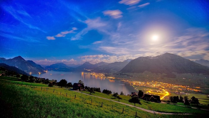 Mountains, City Lights, Lake, and Landscape at Night