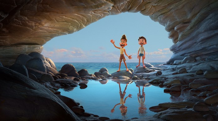 Luca and Alberto in a cave by the sea