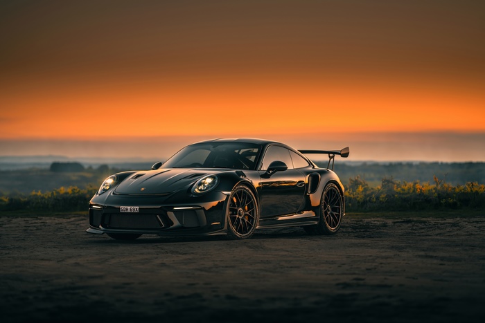 Black Porsche 911 Sport Car at Sunset