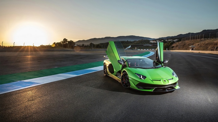 Green Lamborghini Aventador SVJ on Racetrack