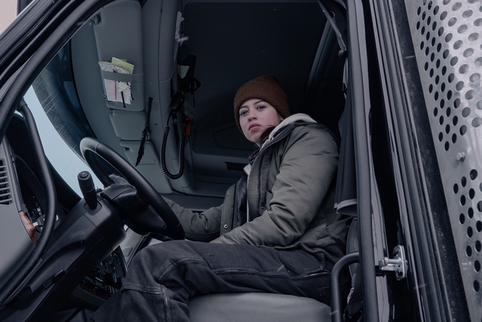 Amber Midthunder in a truck