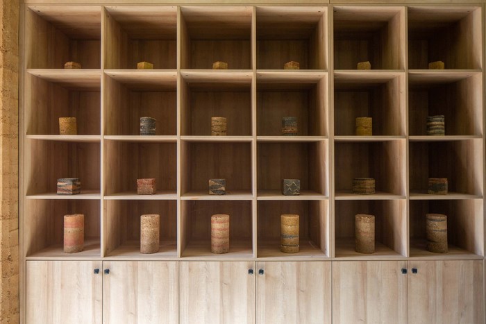library, shelves, rammed earth