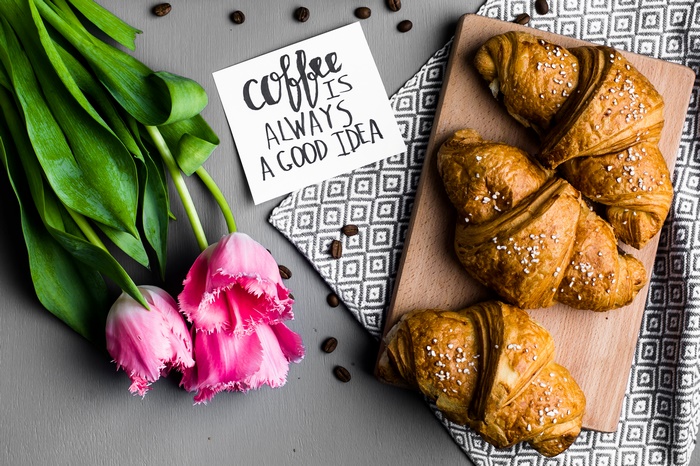 Pink Tulips and Croissants with Coffee Beans
