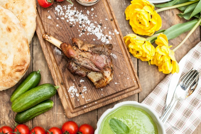 muscles, bones, cucumbers, food, meat, cutting board, tomatoes, animals, wooden surface, bread, Black pepper (Spice), flowers, salt, flesh