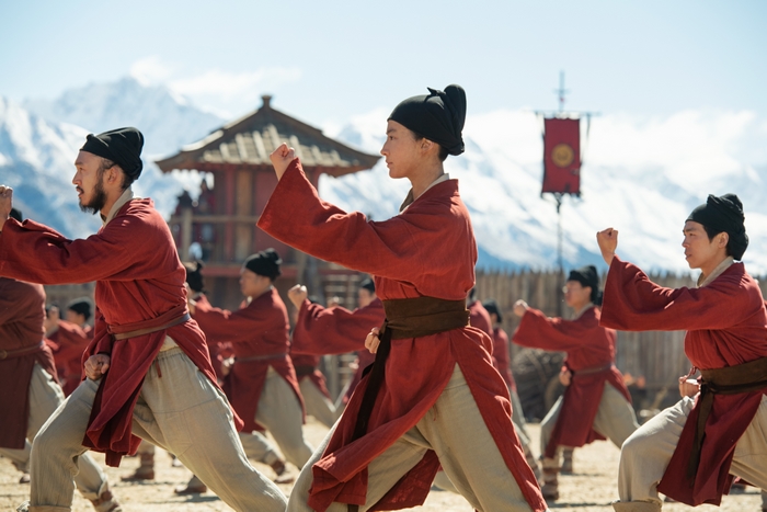 Mulan training in red robes