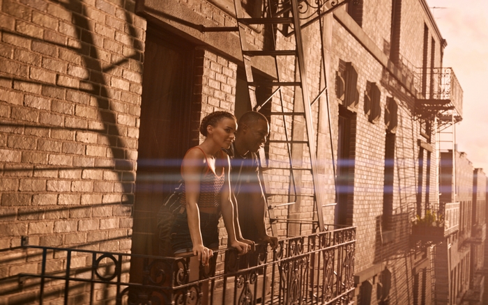 In The Heights Leslie Grace and Corey Hawkins on Balcony