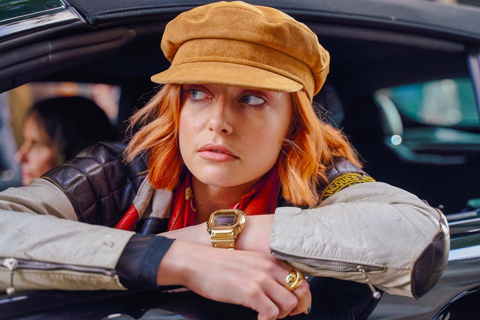 Sophie Simnett in a car