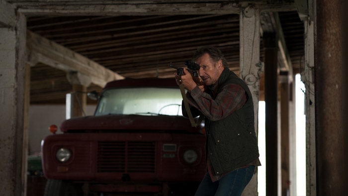 Liam Neeson aims rifle in The Marksman