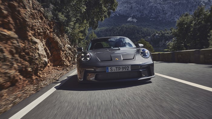 2022 Porsche 911 GT3 Touring driving on a mountain road