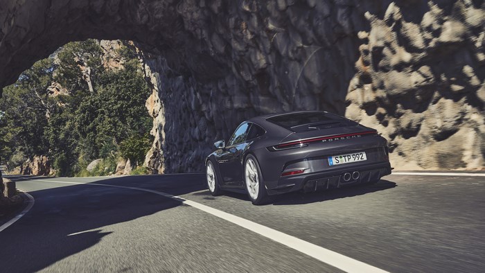 2022 Porsche 911 GT3 Touring driving through a tunnel