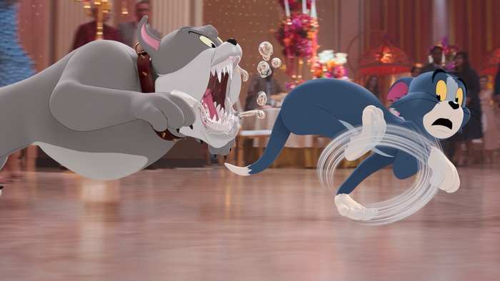 Tom and Jerry chase Spike at a party